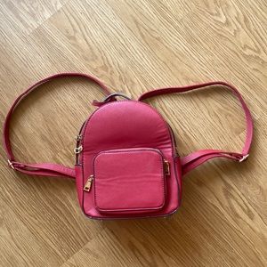 Red faux leather back pack